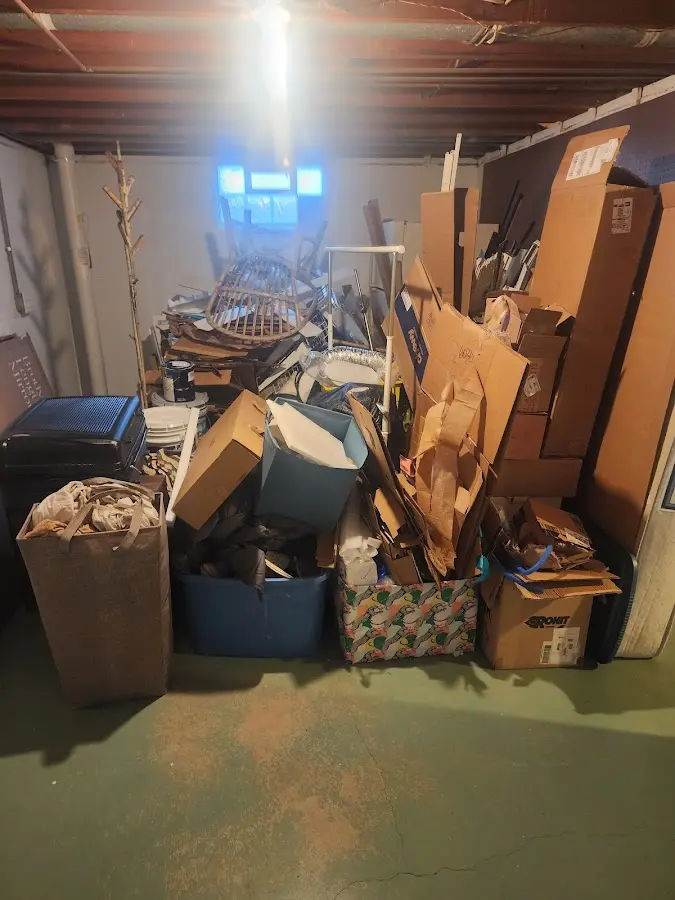 Roll-off dumpster container at job site for 2 Yard Dumpster Rental in Newton Falls